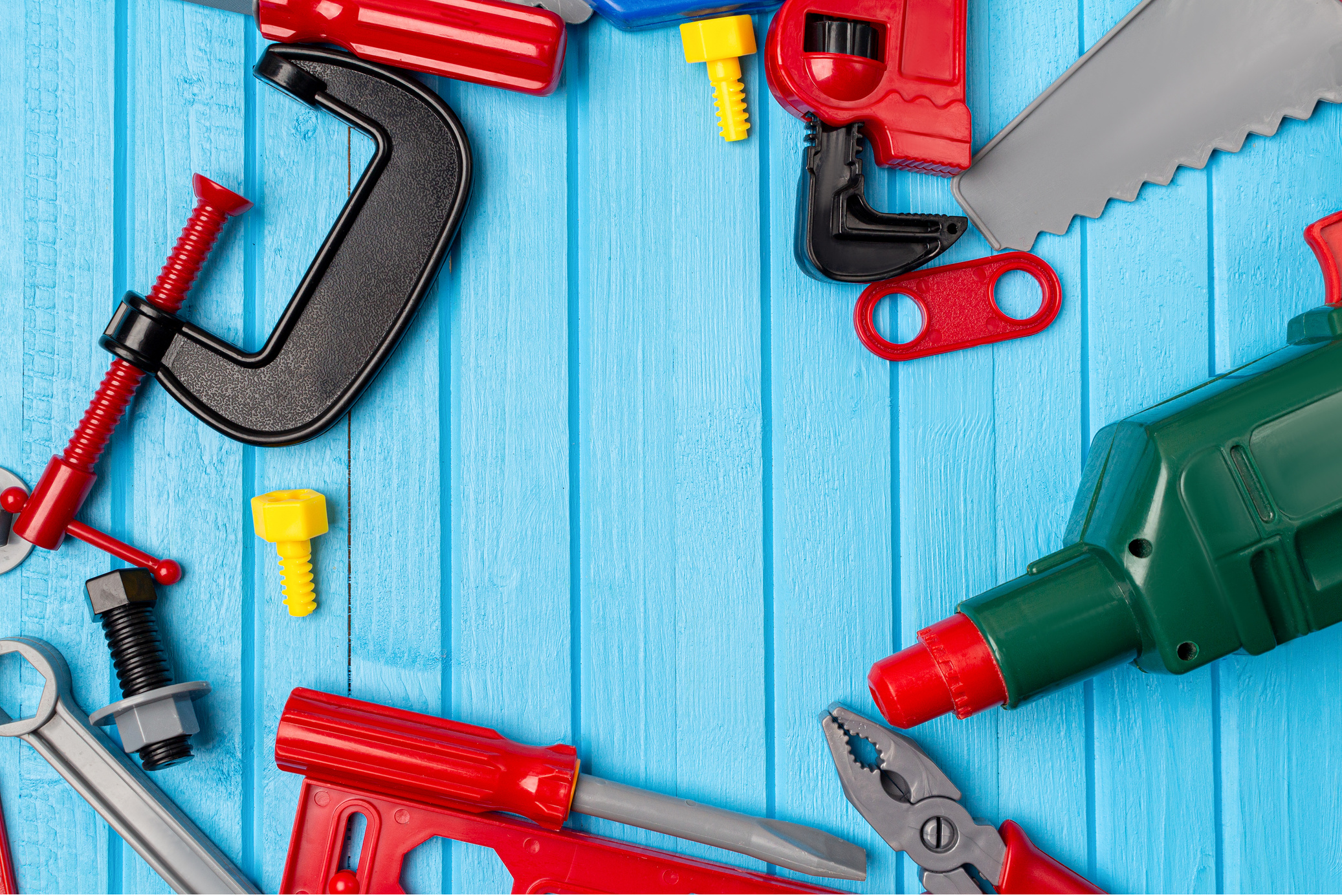 kids, children colorful toys, tools, wrenches, instrument background with copy space